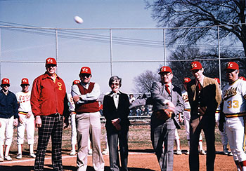 color photo of the first pitch being thrown at the first mens baseball game in 1980