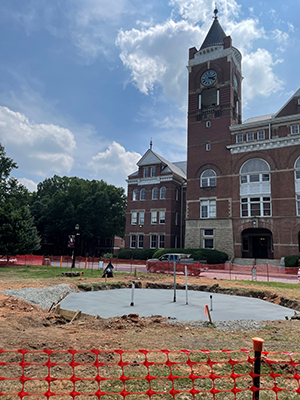 another angle of the new concrete pad. Tillman Hall is visible in the background