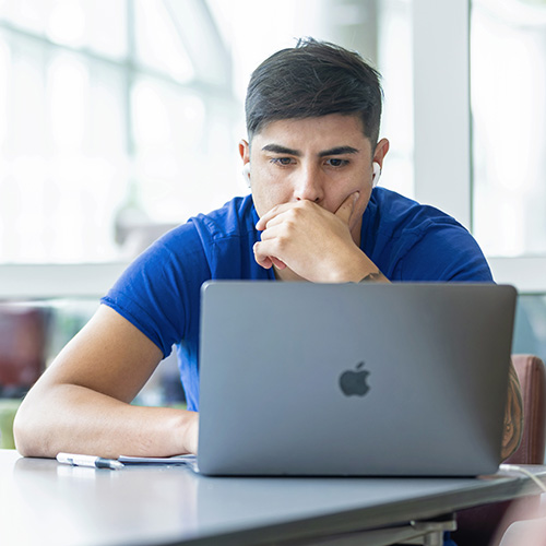 A student working on a laptop